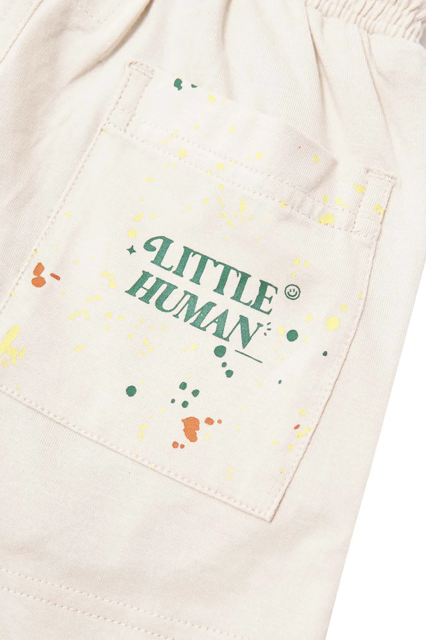 "PAINT SPLAT" LITTLE HUMAN PLEATED SHORTS IN OAT